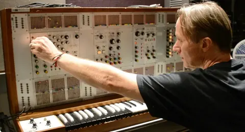 Freddy Fresh patching a modular synthesizer